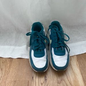 Teal and like green Nike air tennis shoes